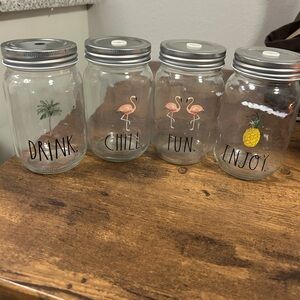 Set of Four Decorative Glass Jars with Tropical Designs